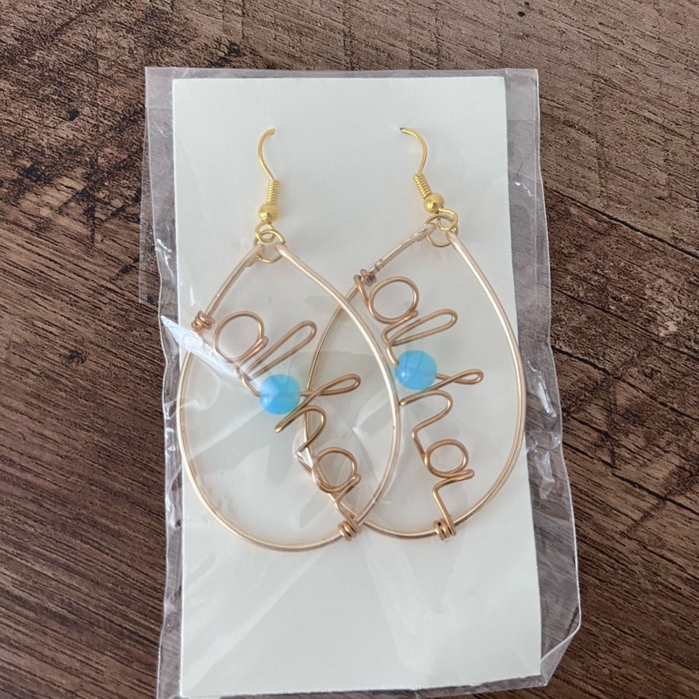 Earrings - wire wrap ALOHA with blue bead